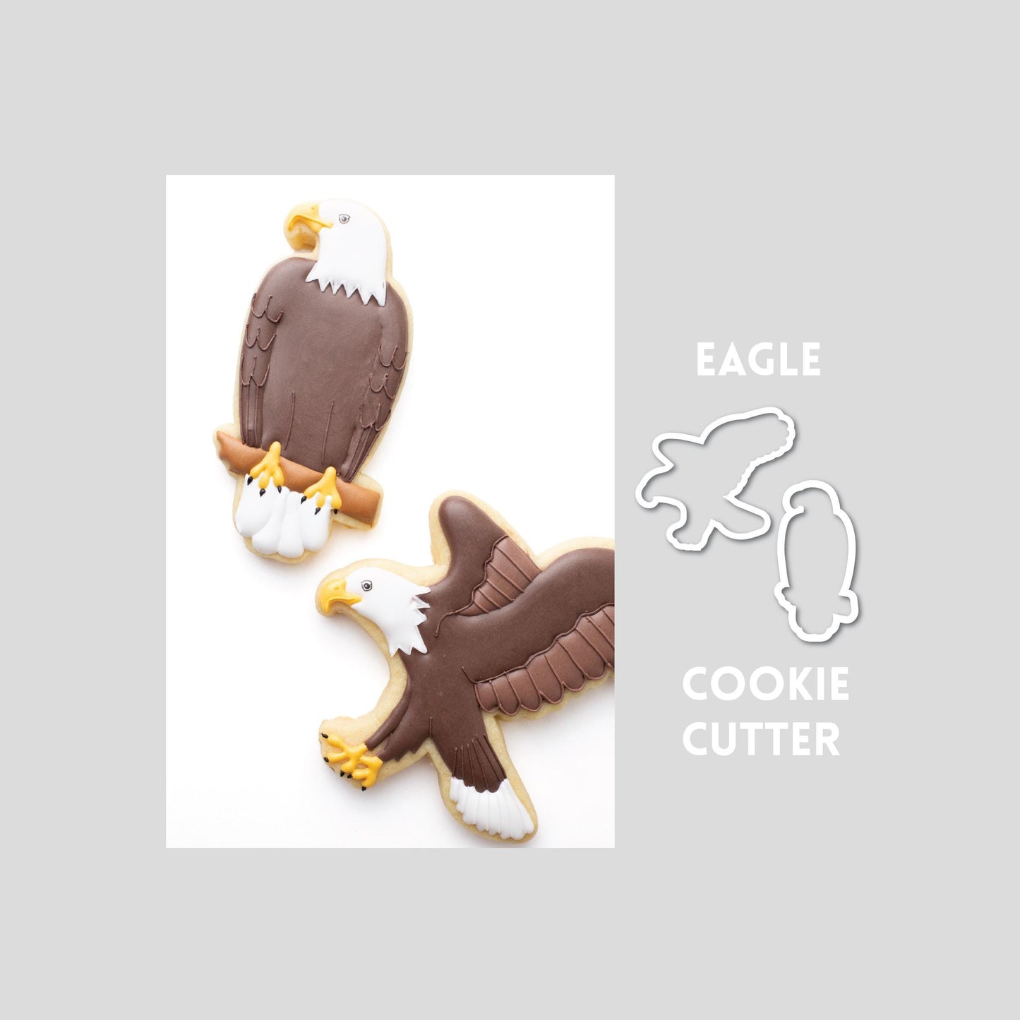 Decorated eagle sugar cookies, one flying and one on abranch, next to eagle cookie cutters outline on a gray background.