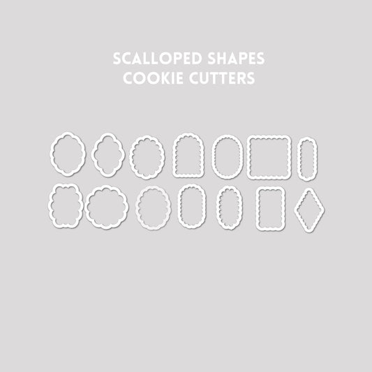 Various scalloped shaped cookie cutter outlines on a gray background.