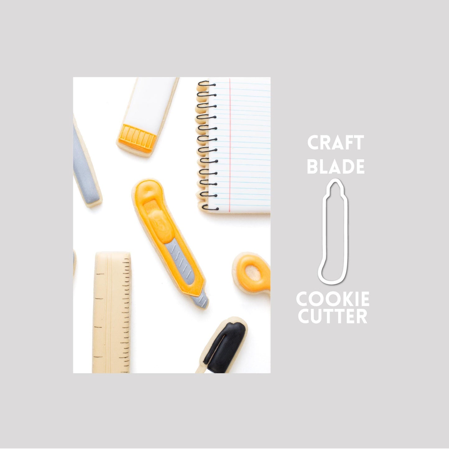 Decorated craft blade sugar cookie next to a craft blade cookie cutter outline on a gray background.