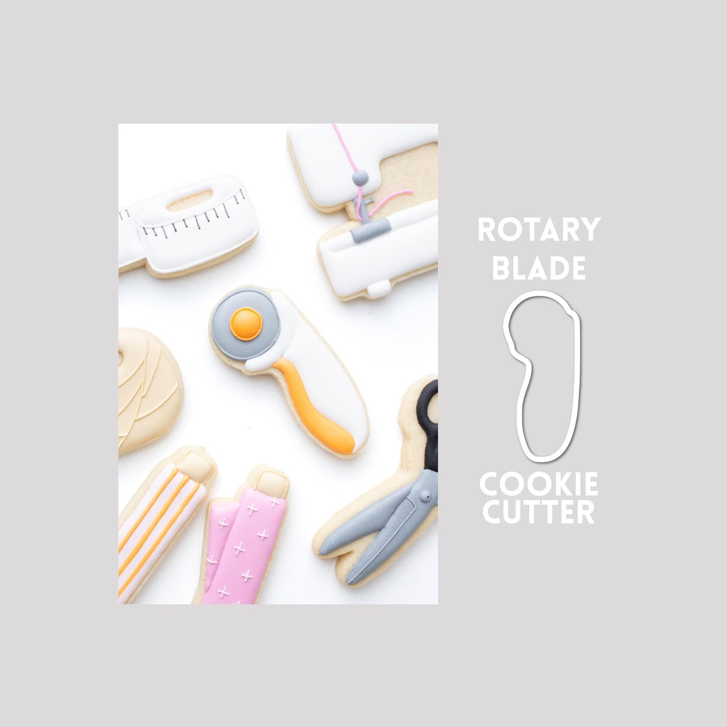 Decorated rotary blade sugar cookie next to a rotary blade cookie cutter outline on a gray background.
