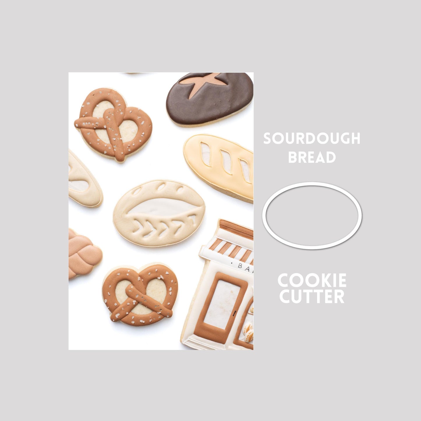 Decorated sourdough bread sugar cookie next to a sourdough bread cookie cutter outline on a gray background.