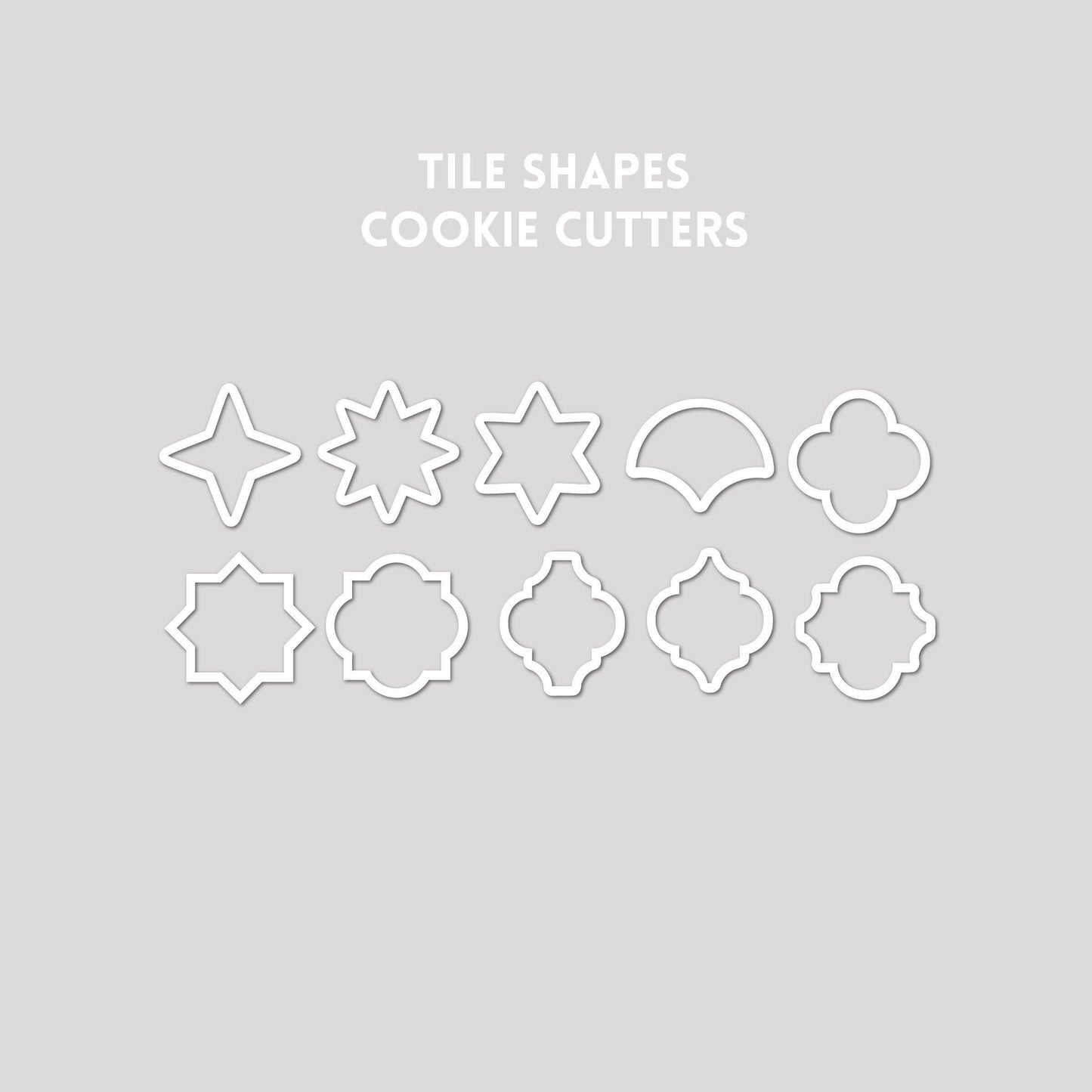 Various tile shaped cookie cutter outlines on a gray background.