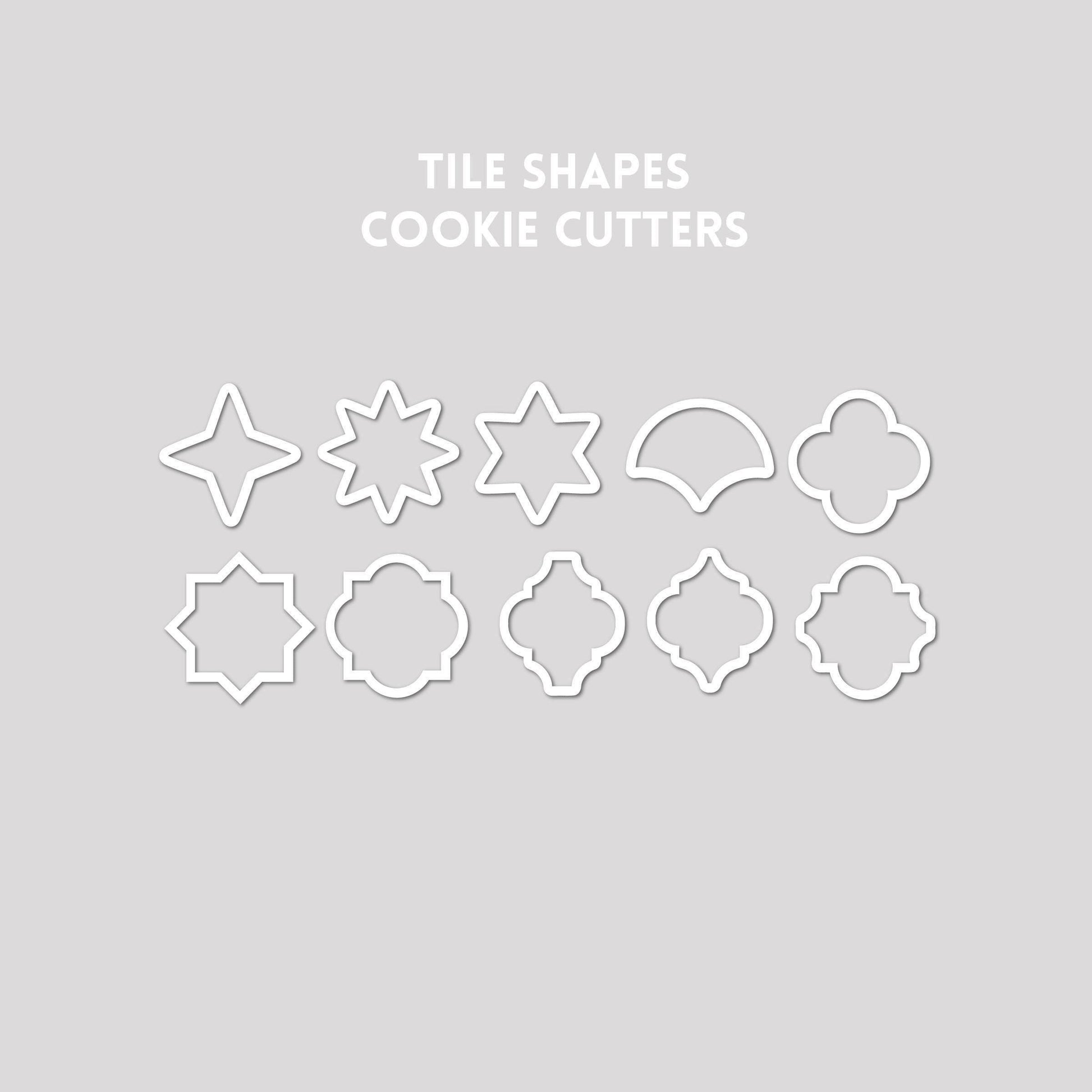 Various tile shaped cookie cutter outlines on a gray background.
