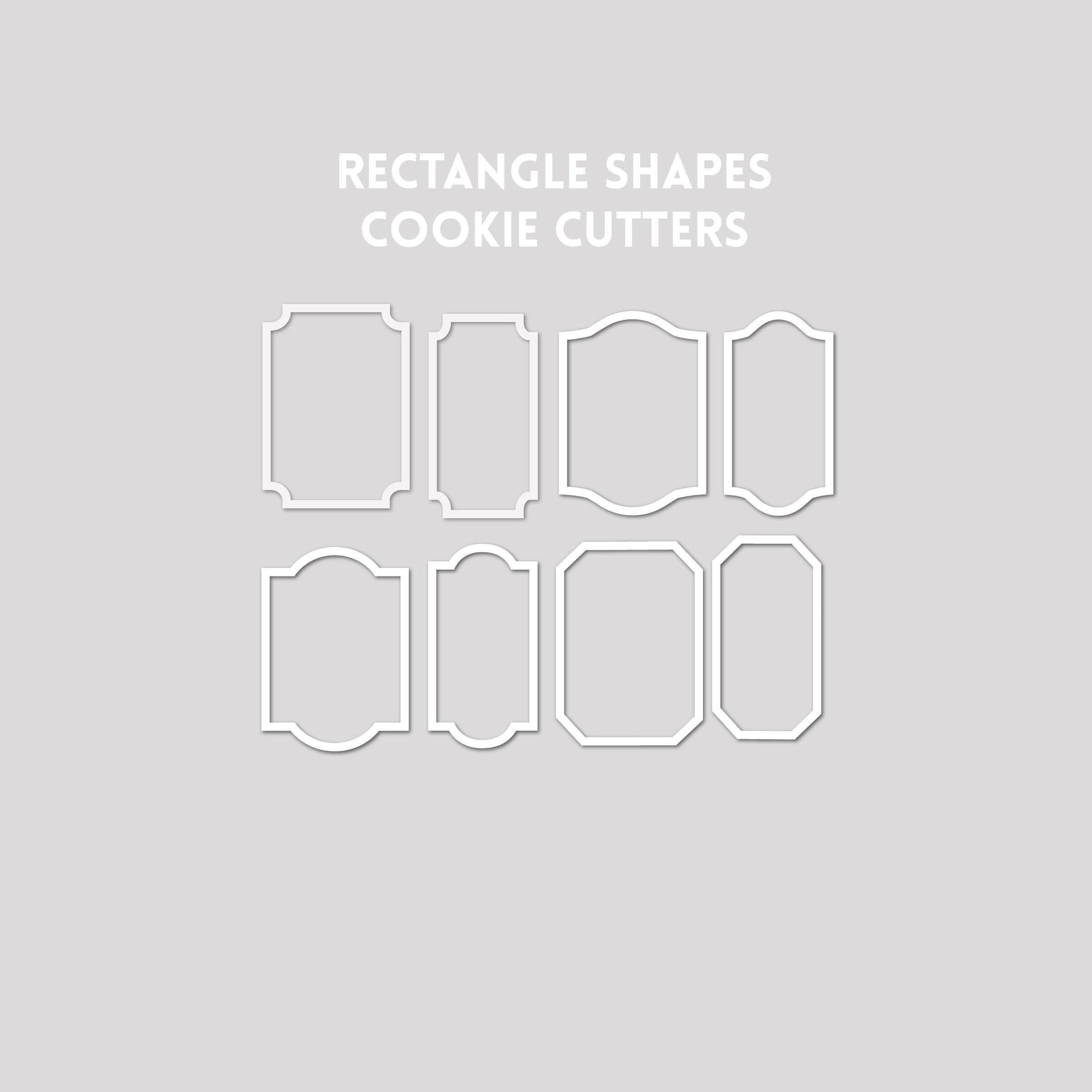Various rectangle shaped cookie cutter outlines on a gray background.