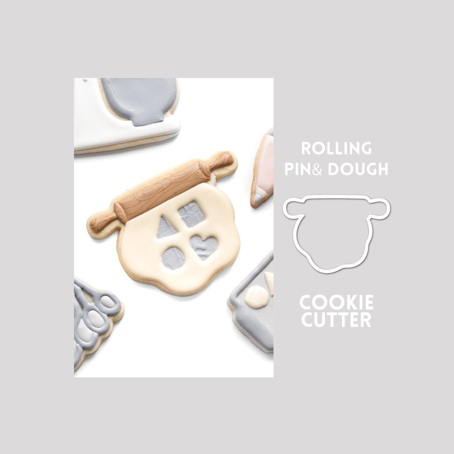 Decorated rolling pin and dough sugar cookie next to a rolling pin and dough cookie cutter outline on a gray background.