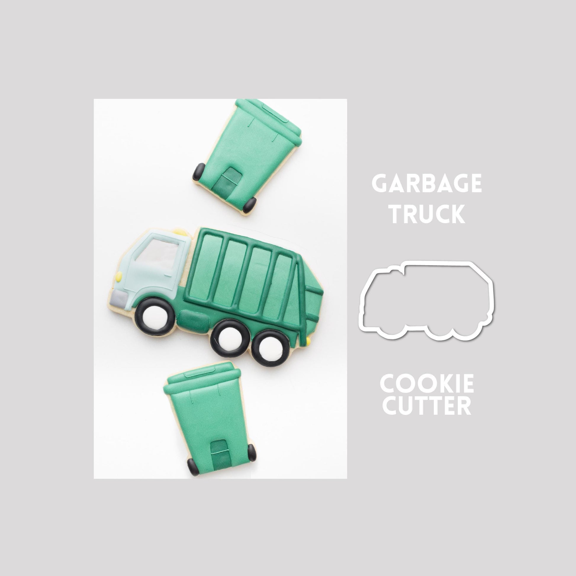 Decorated garbage truck sugar cookie next to a garbage truck cookie cutter outline on a gray background.
