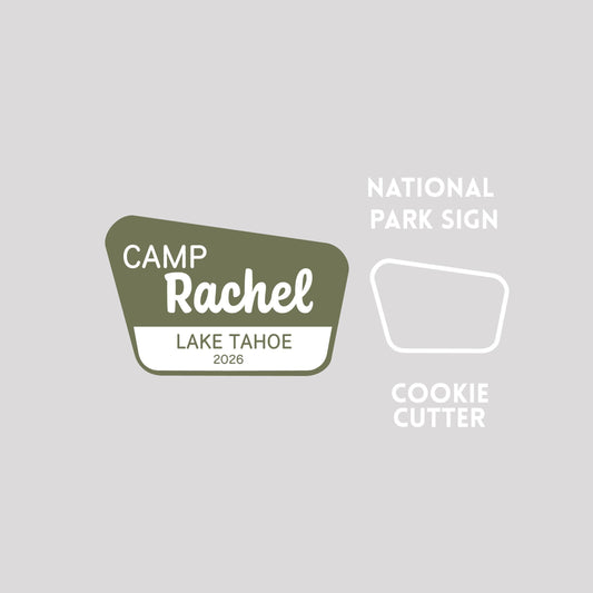 National park sign next to a national park sign cookie cutter outline on a gray background.
