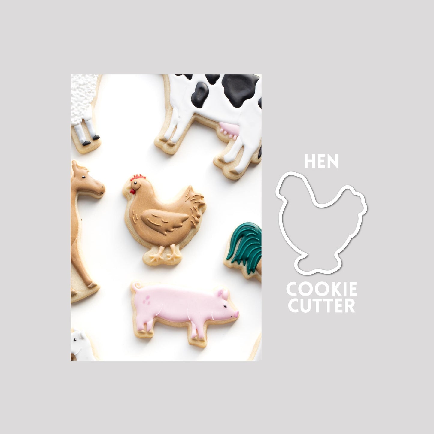 Decorated hen sugar cookie next to a hen cookie cutter outline on a gray background.