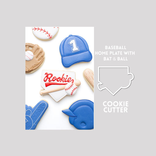Decorated baseball home plate with bat and ball sugar cookie next to a baseball home plate with bat and ball cookie cutter outline on a gray background.