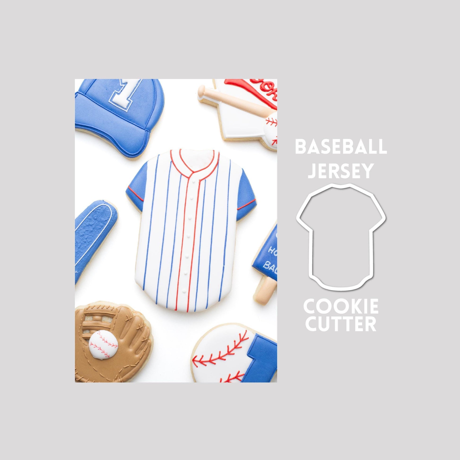 Decorated baseball jersey sugar cookie next to a baseball jersey cookie cutter outline on a gray background.