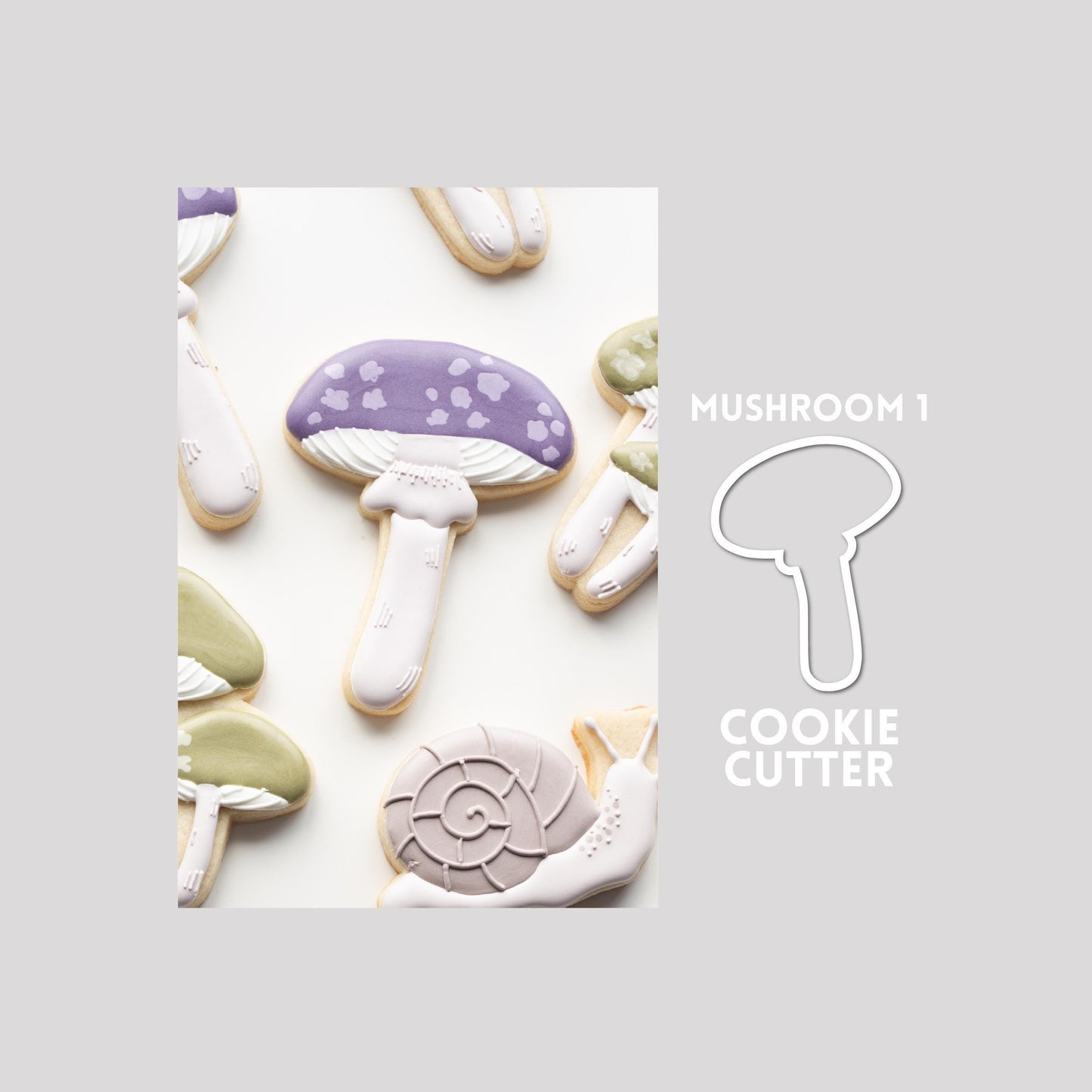 Decorated mushroom sugar cookie next to a mushroom cookie cutter outline on a gray background.