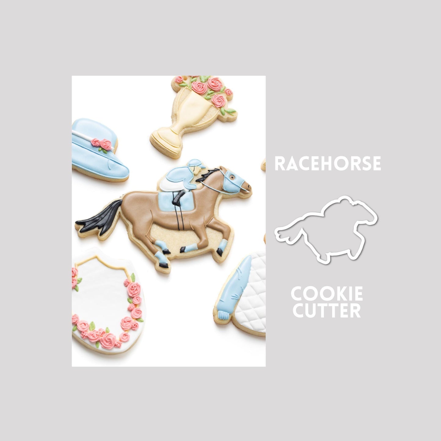 Decorated racehorse sugar cookie next to a racehorse cookie cutter outline on a gray background.
