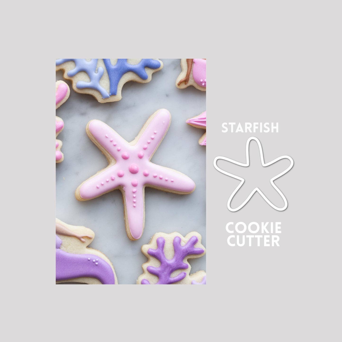 Decorated starfish sugar cookie next to a starfish cookie cutter outline on a gray background.