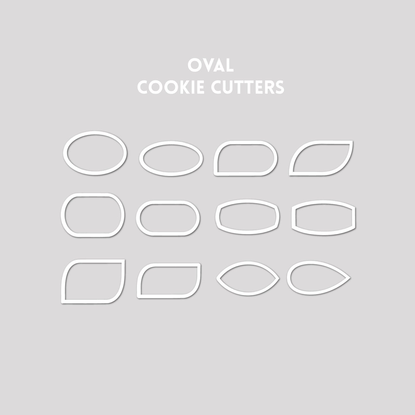 Various oval shaped cookie cutter outlines on a gray background.