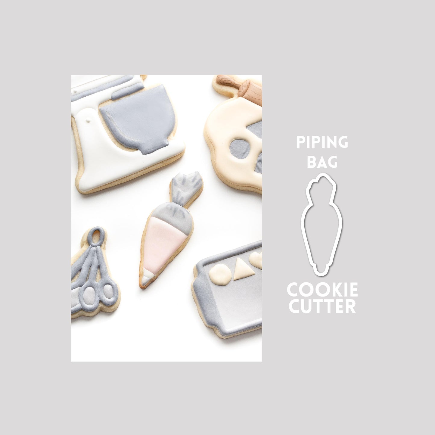 Decorated piping bag sugar cookie next to a piping bag cookie cutter outline on a gray background.