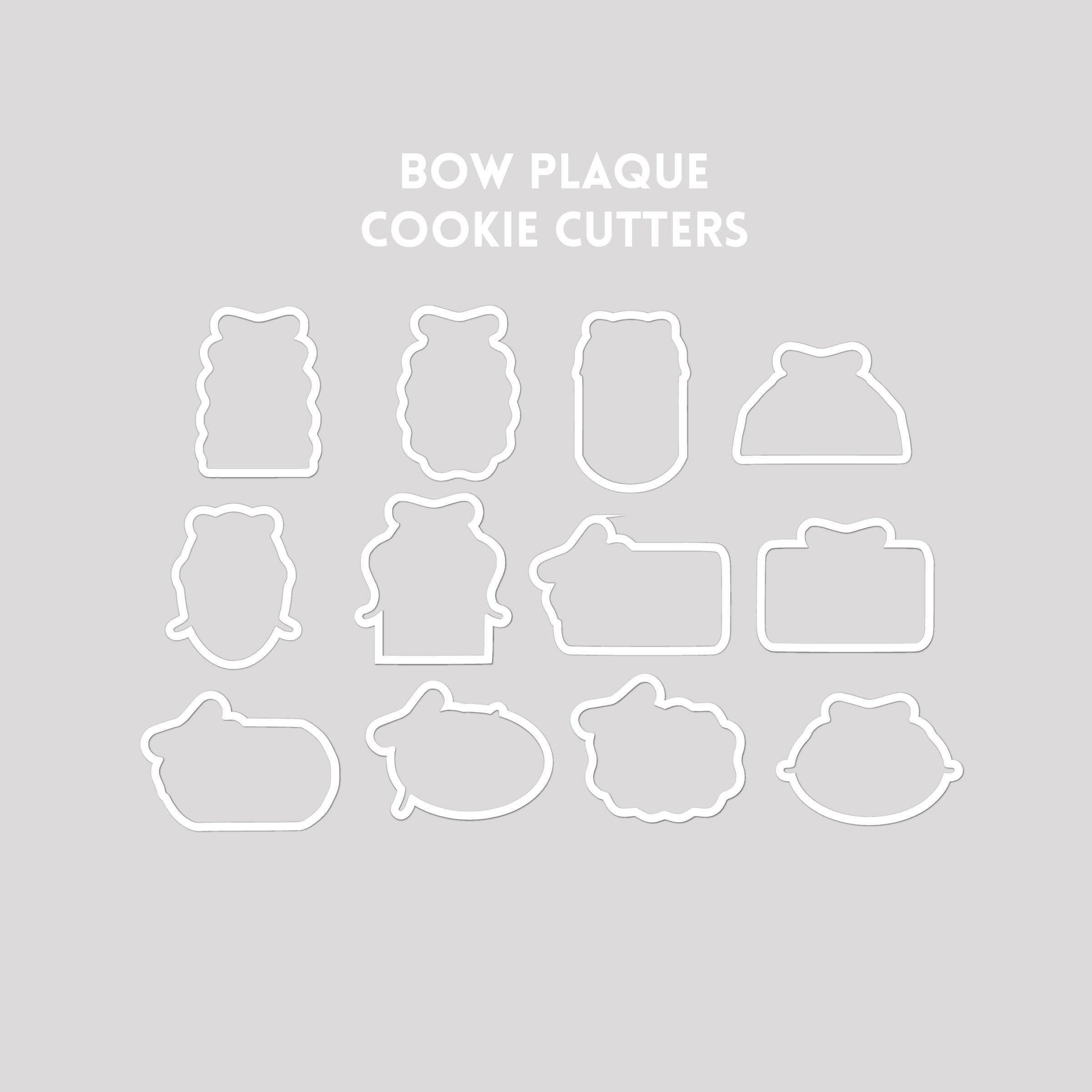Bow plaque shaped cookie cutter outlines on a gray background.