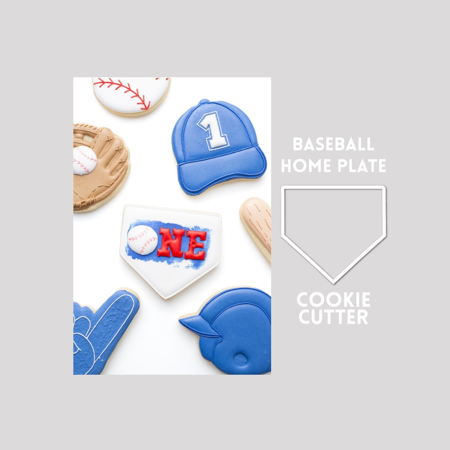 Decorated baseball home plate sugar cookie next to a baseball home plate cookie cutter outline on a gray background.