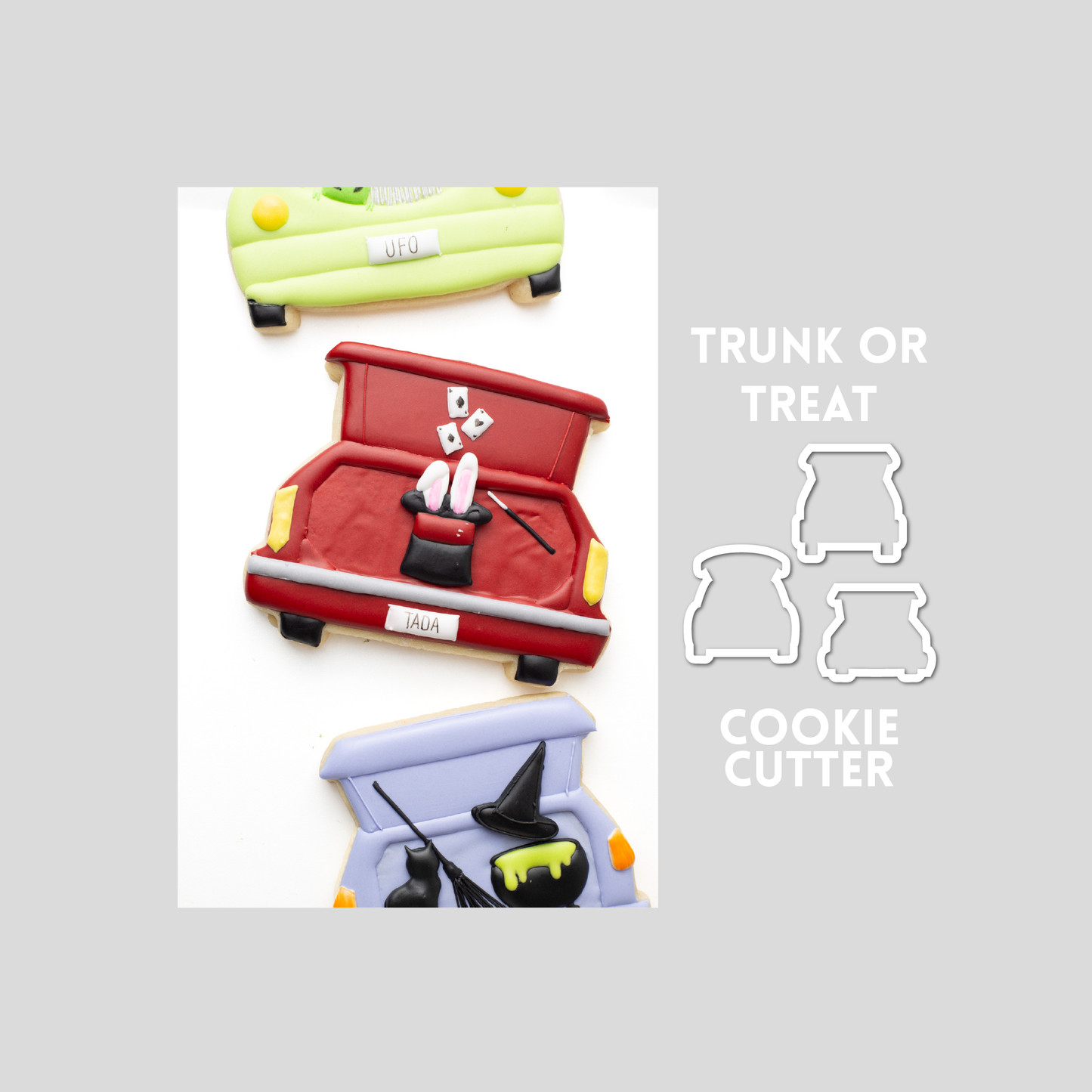 Decorated car trunk or treat sugar cookie next to a trunk or treat cookie cutter outline on a gray background. 