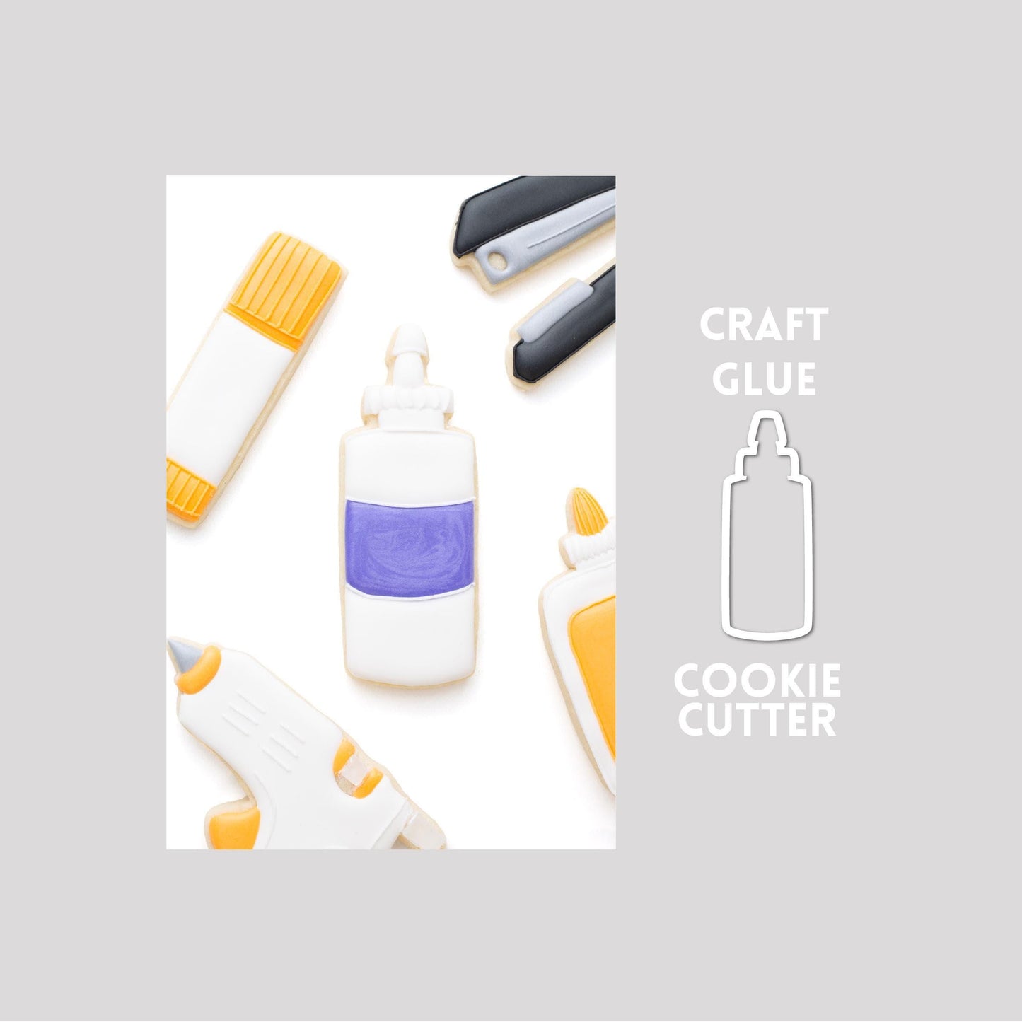 Decorated craft glue sugar cookie next to a craft glue cookie cutter outline on a gray background.
