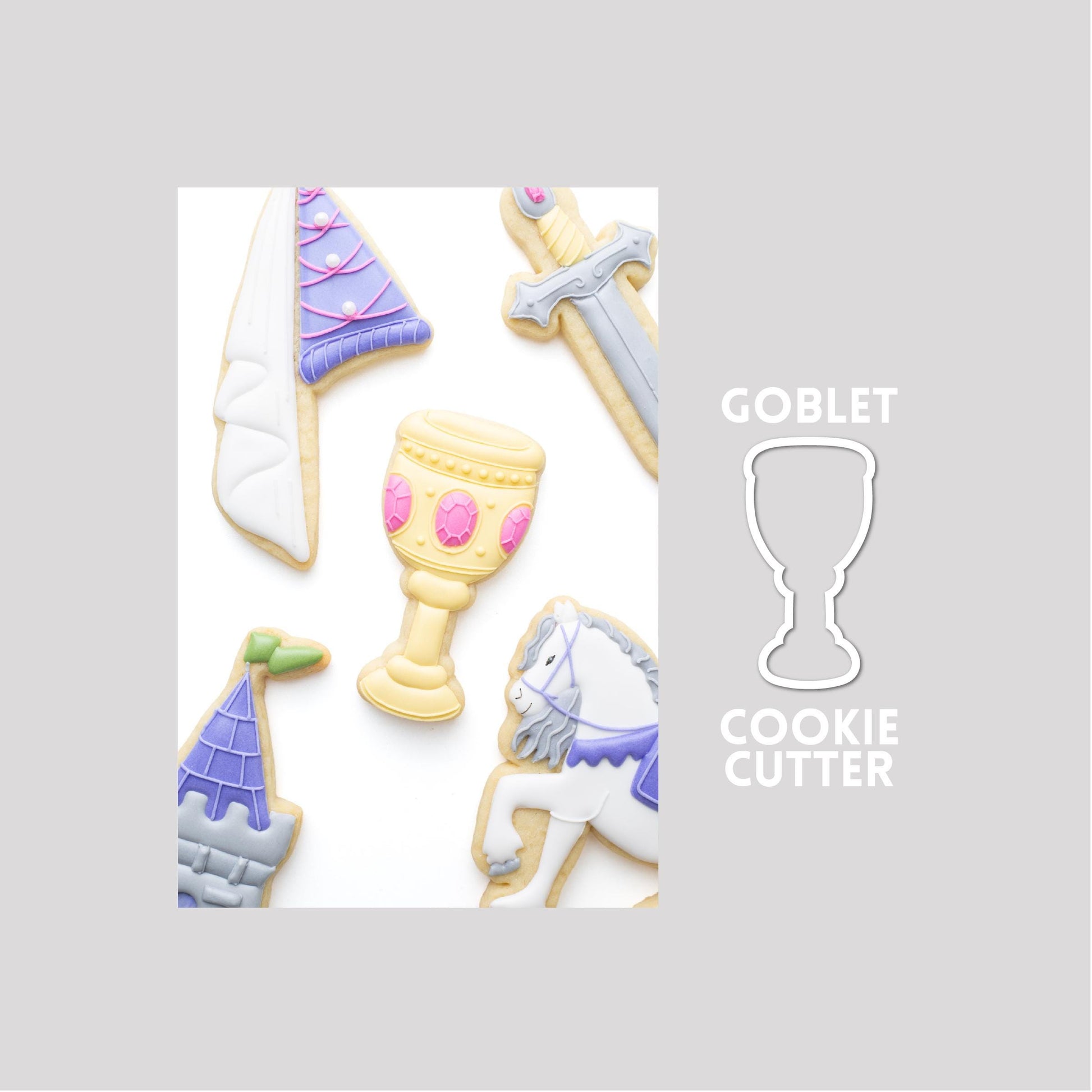 Decorated medieval goblet sugar cookie  next to a medieval goblet cookie cutter outline on a gray background.