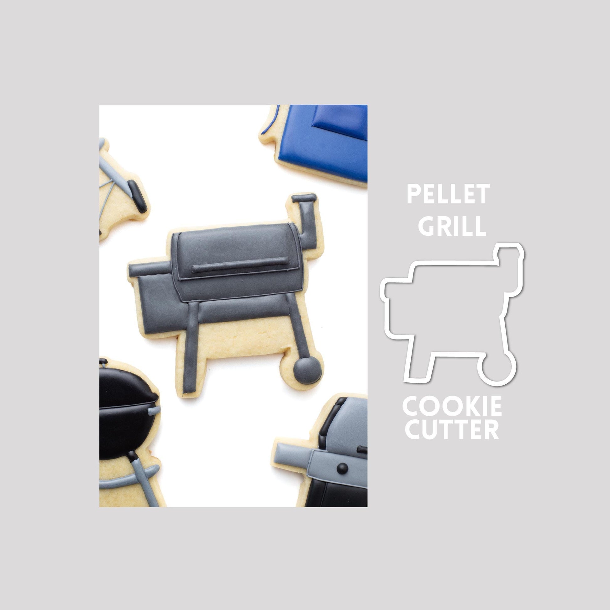 Decorated pellet grill sugar cookie next to a pellet grill cookie cutter outline on a gray background.