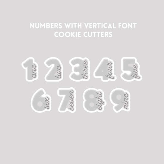 Various numbers with vertical font cookie cutter outlines on a gray background.