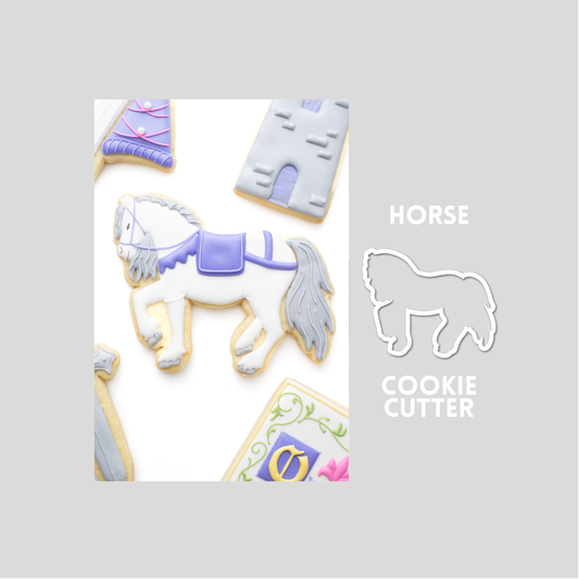 Decorated horse sugar cookie next to a horse cookie cutter outline on a gray background.