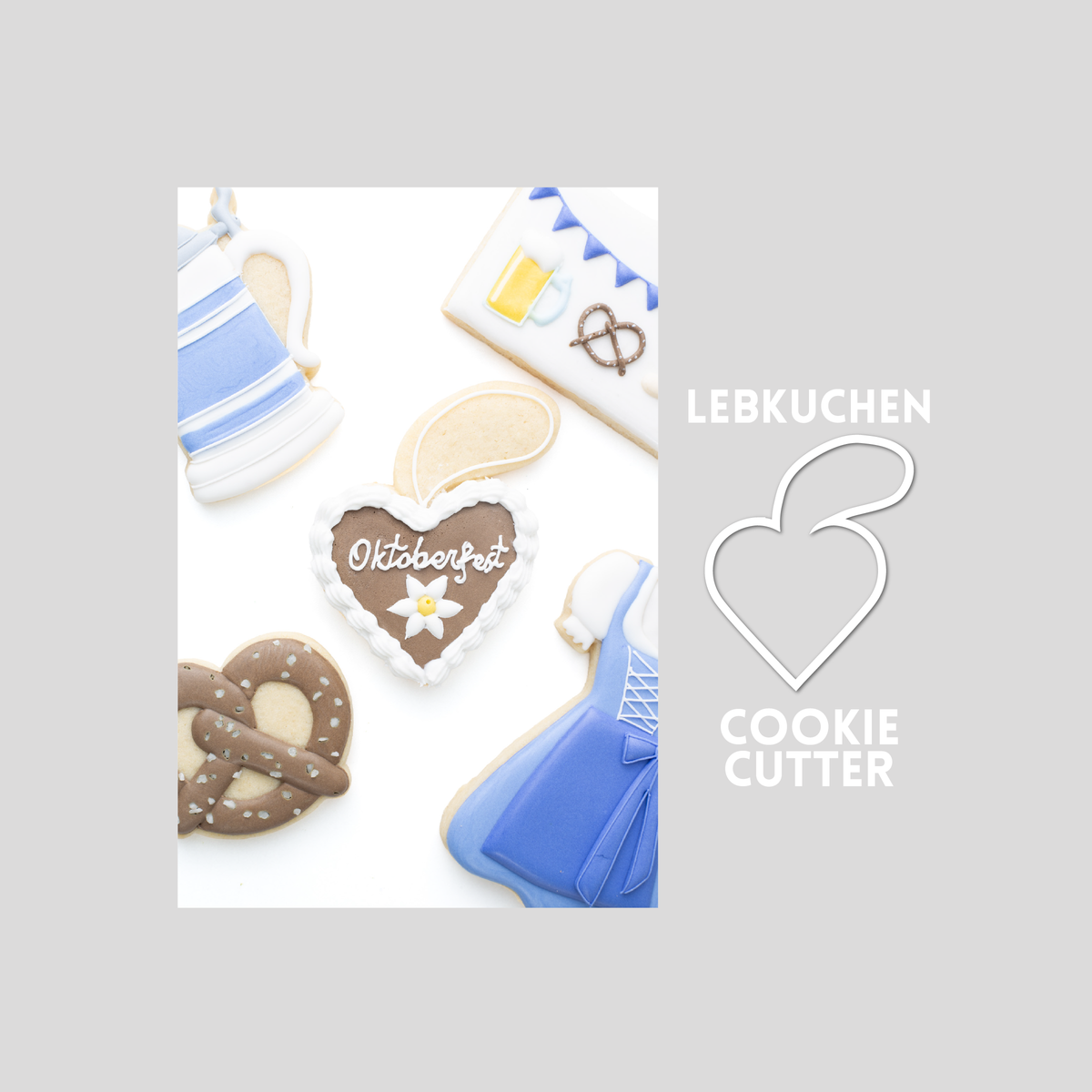 Decorated lebkuchen sugar cookie next to a lebkuchen cookie cutter outline on a gray background.